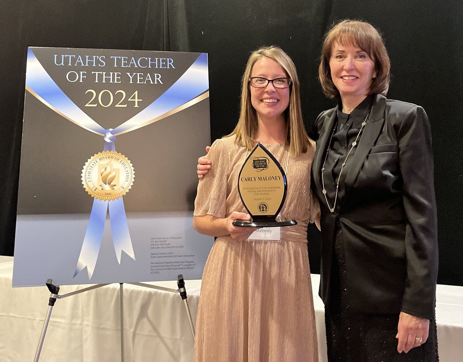 picture of two women at an awards ceremony